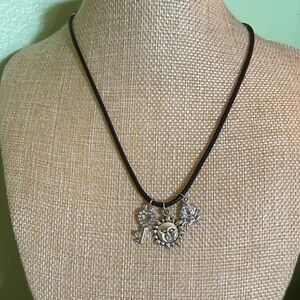 Boho necklace with silver rose, key and smiling sun pendants